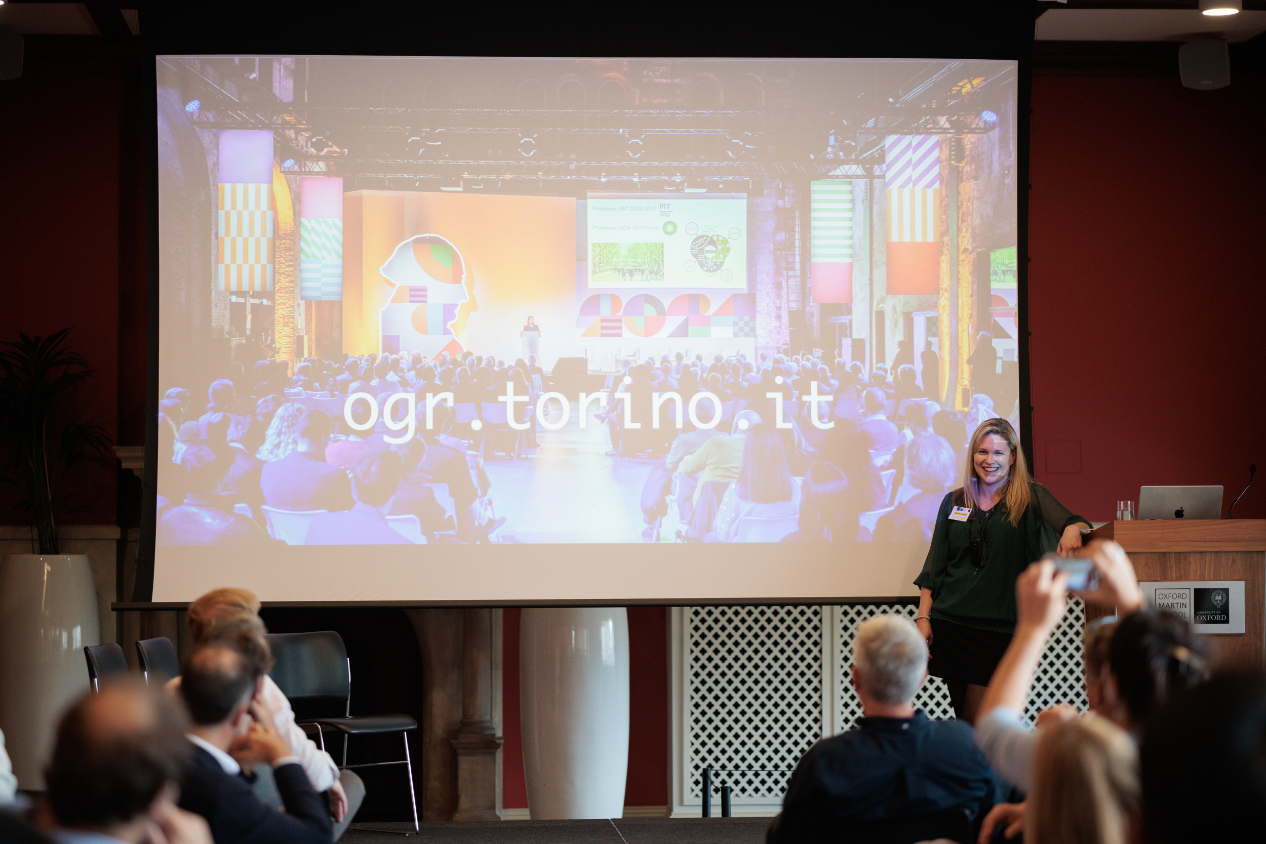 A presentation slide with "ogr.torino.ir" written.