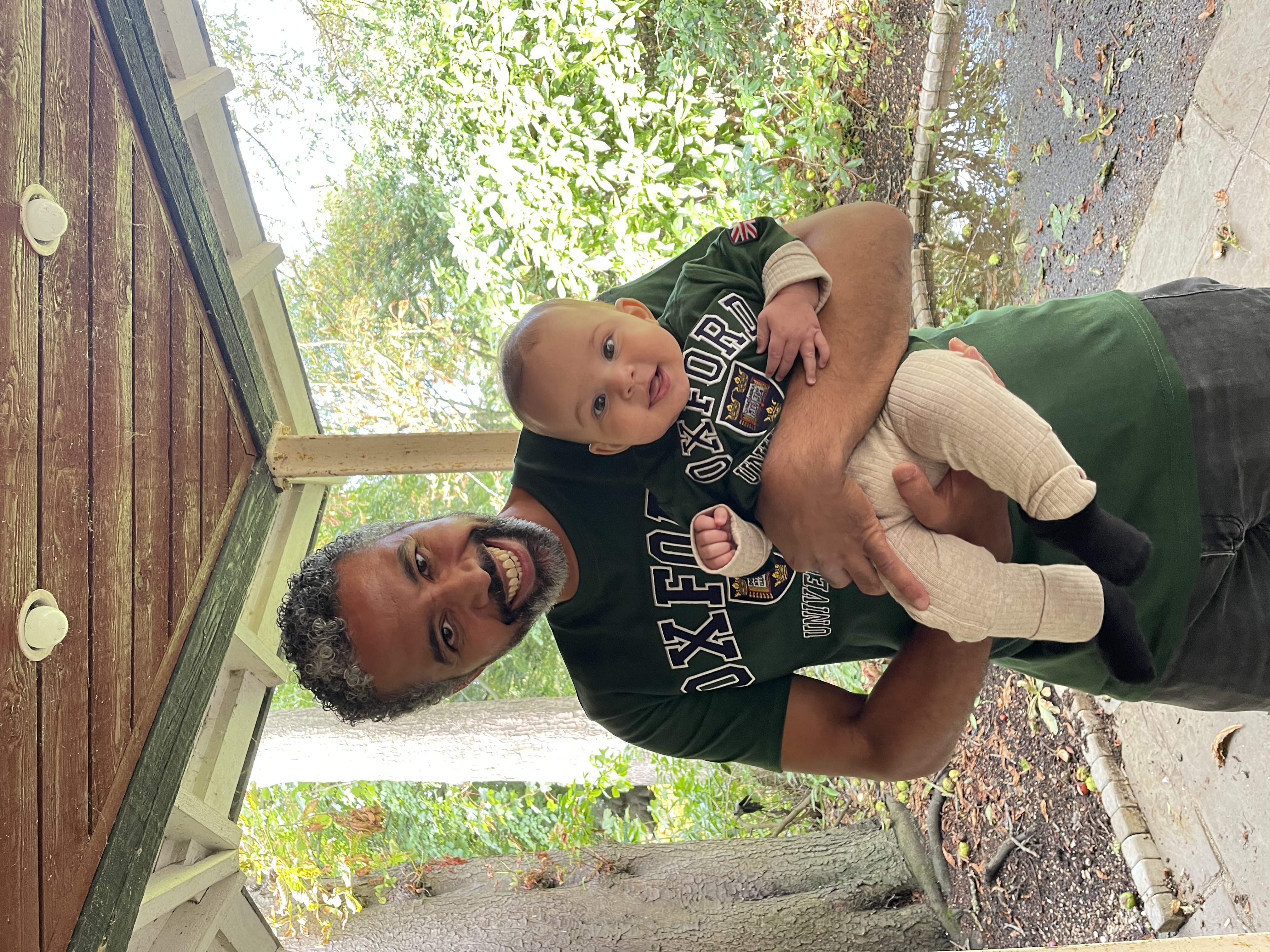 Researcher holding baby