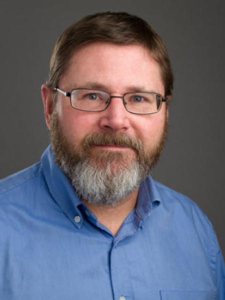 Headshot of James Raymer