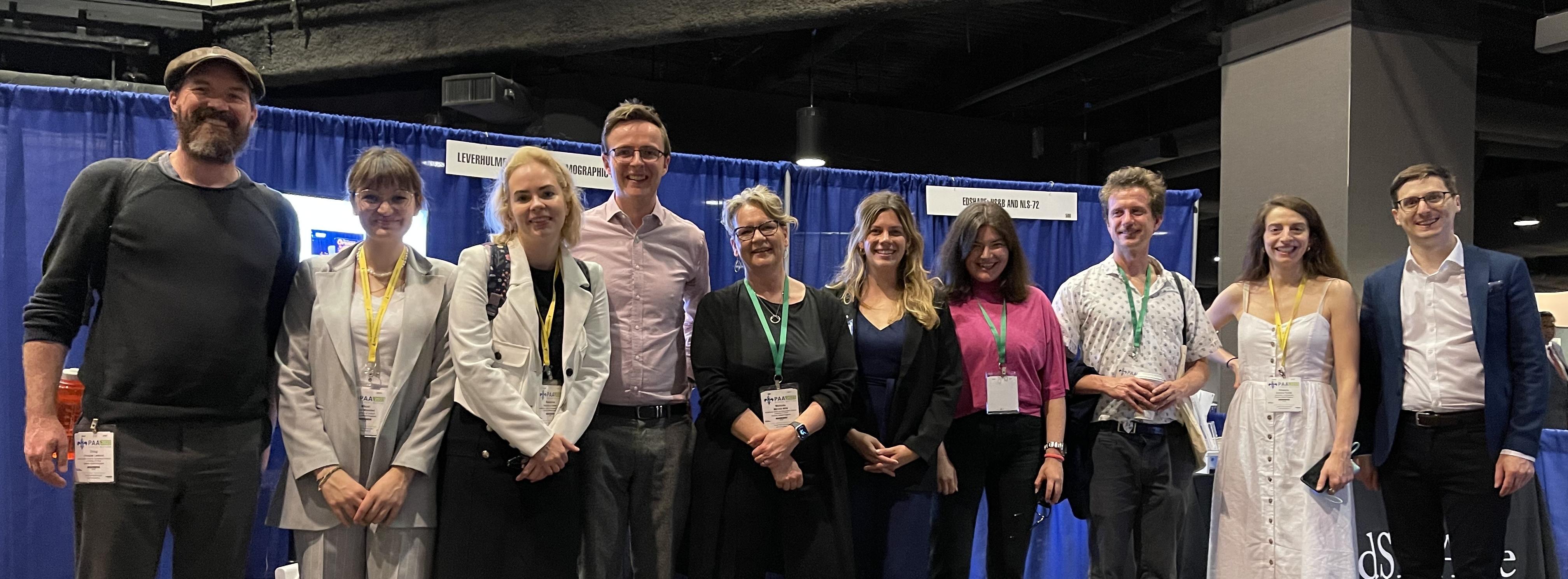 LCDS members in front of our booth at PAA 2023