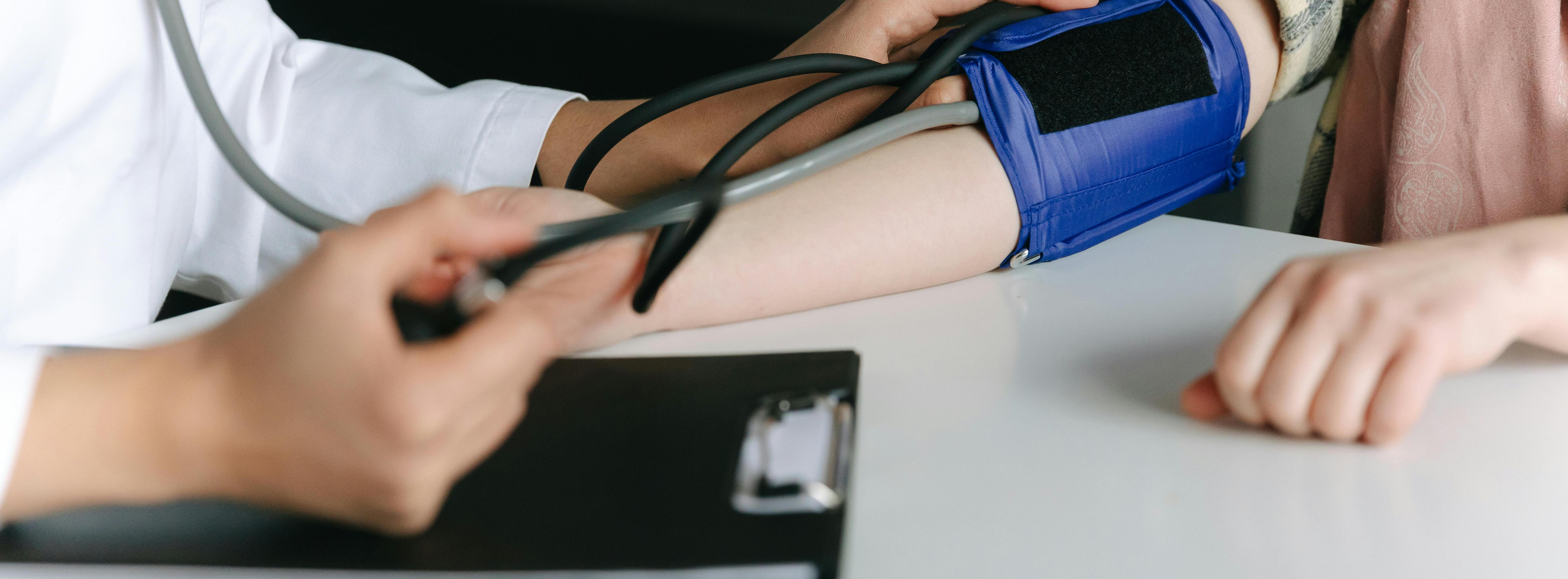 Person having their blood pressure tested