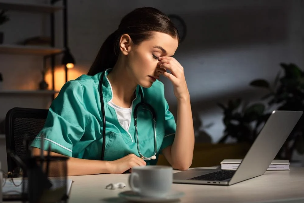 Tired looking woman at medical job