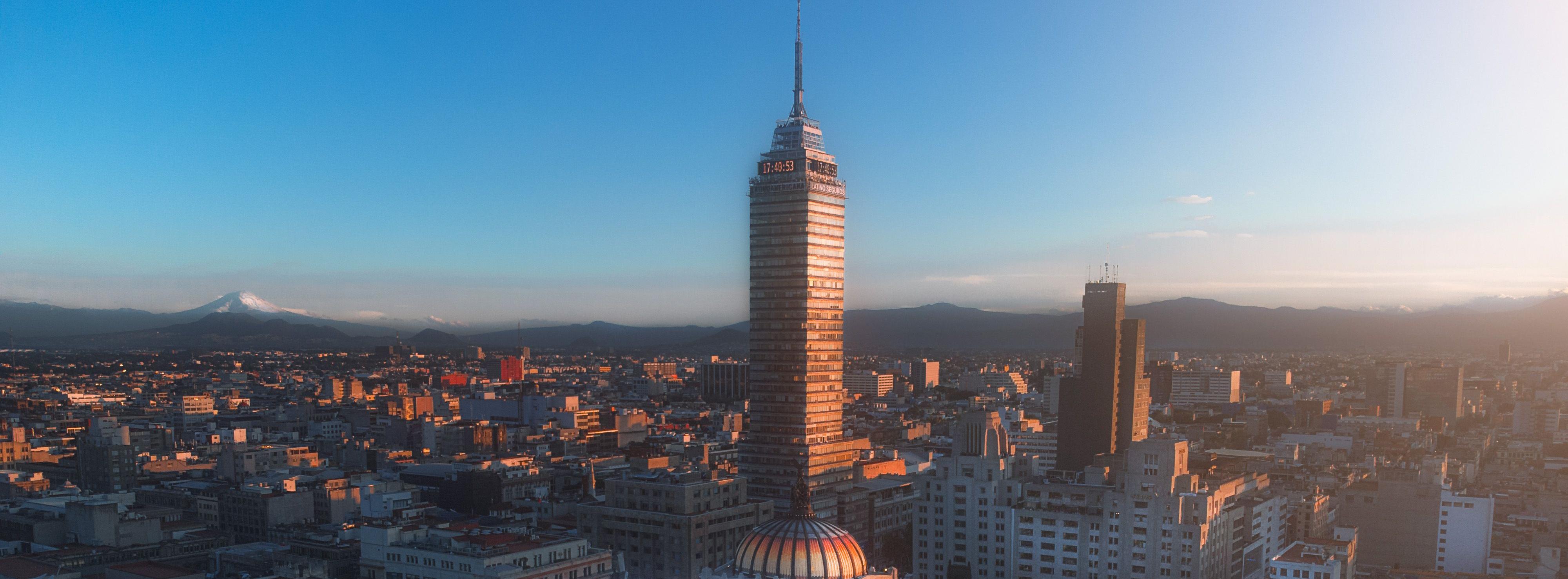 Skyline featuring Torre Latinoamericana in Mexico City during sunset, showcasing urban architecture. Image by FranDany from pexels.