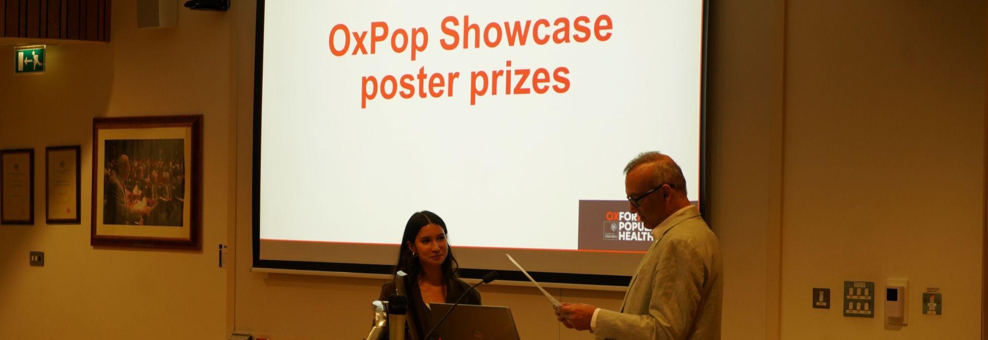 Sai receiving her prize from Professor Prabhat Jha, Head of the Oxford Population Health.