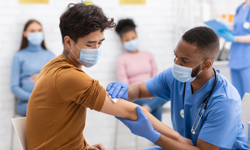 Man receiving COVID vaccine