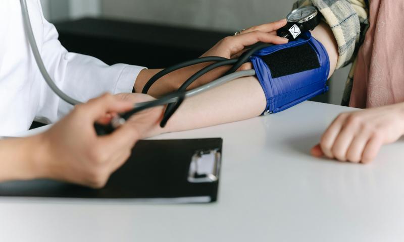 Person having their blood pressure tested