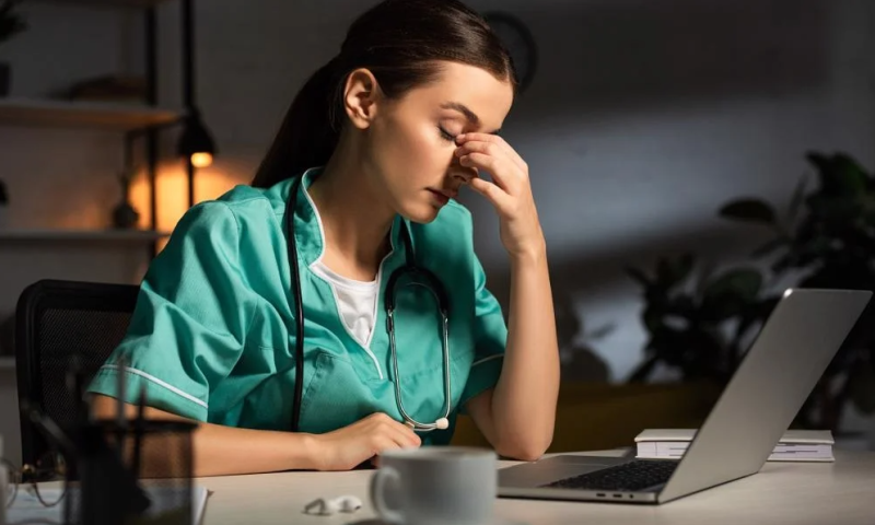 Tired looking woman at medical job